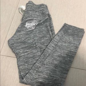 A grey and white gurls sweatpants
